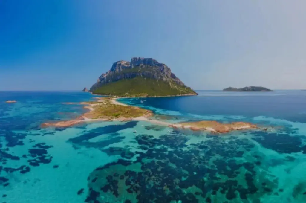 Tavolara island rising above clear water in north-east Sardinia